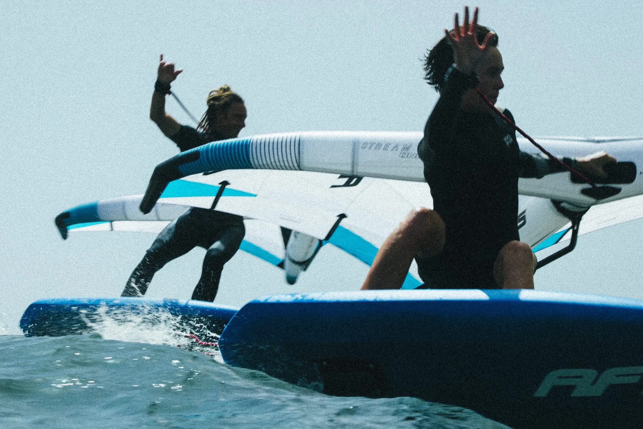 Two wingfoil riders